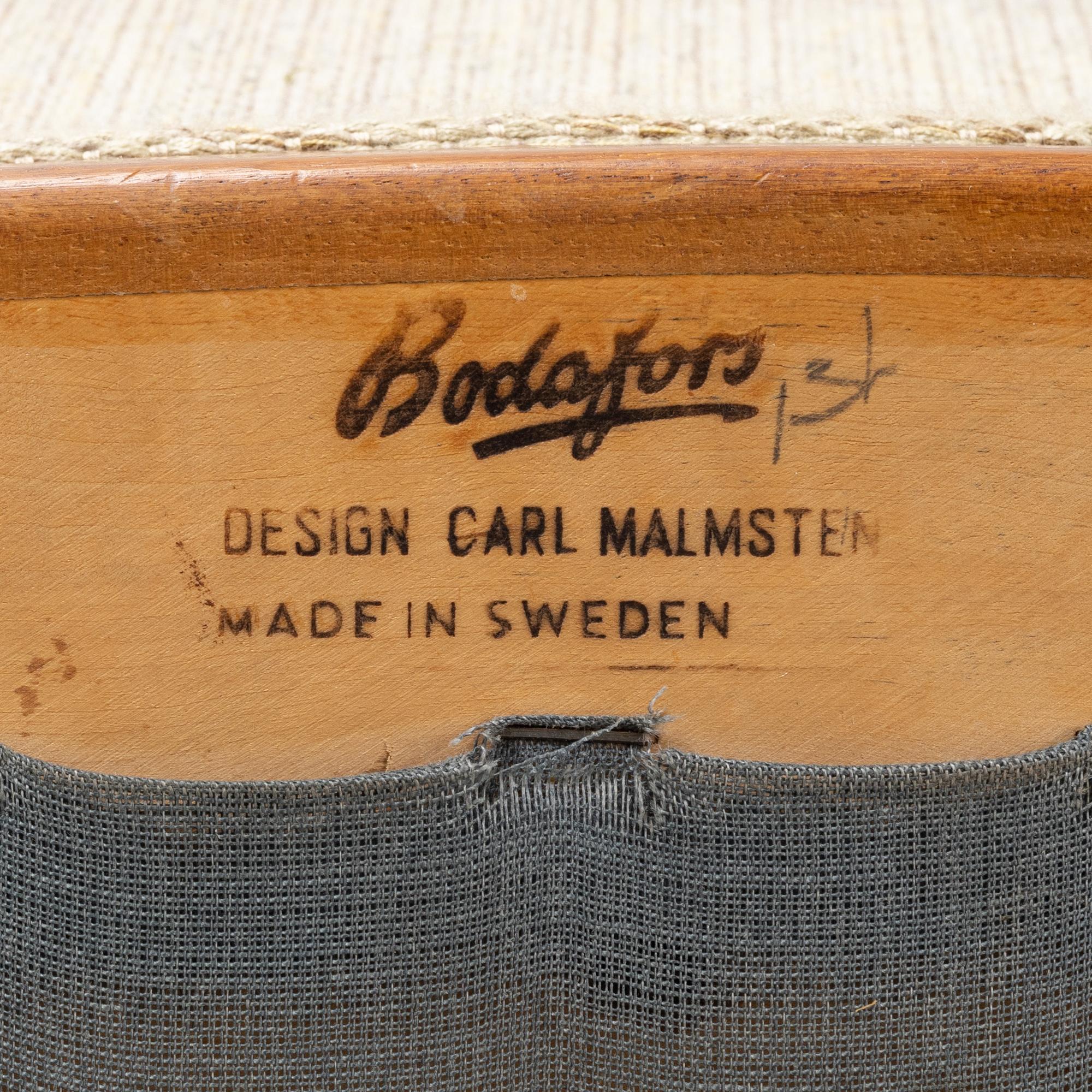 Carl Malmsten, a matched pair of easy chairs, second part of the 20th Century.