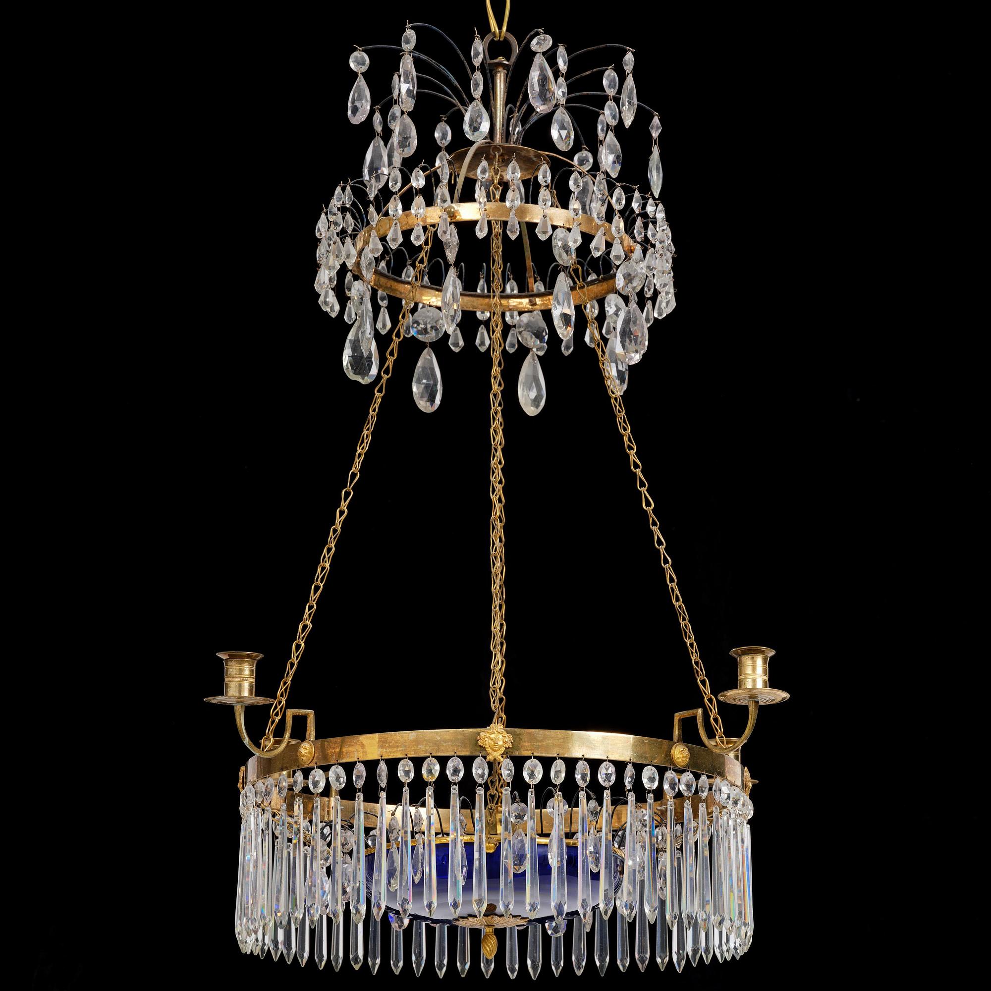 A late Gustavian five-light gilt brass and cut glass chandelier, Stockholm, late 18th century.