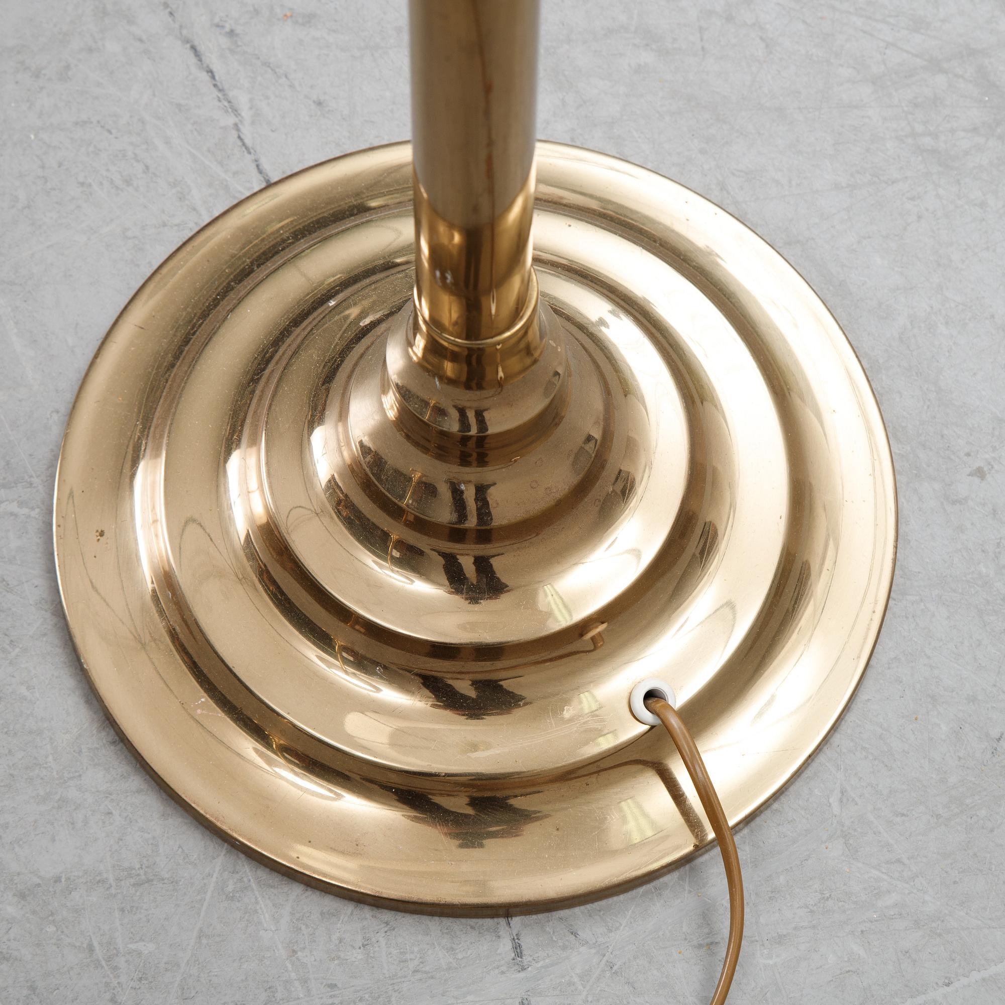 Bergboms, a pair of model 'G-024' brass floor lamps. Second half of the 20th century.