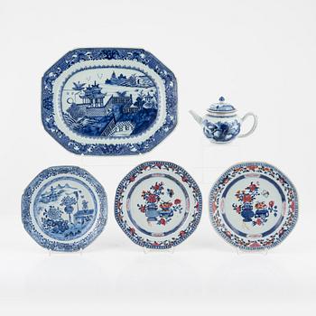 A Chinese porcelain charger, three plates and a teapot, Qing dynasty, Qianlong (1736-95) and China, 19th Century.