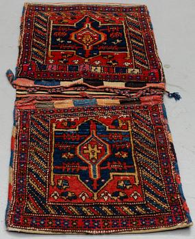 A semi-antique Hamadan Saddlebag, ca 133,5 x 57 cm.