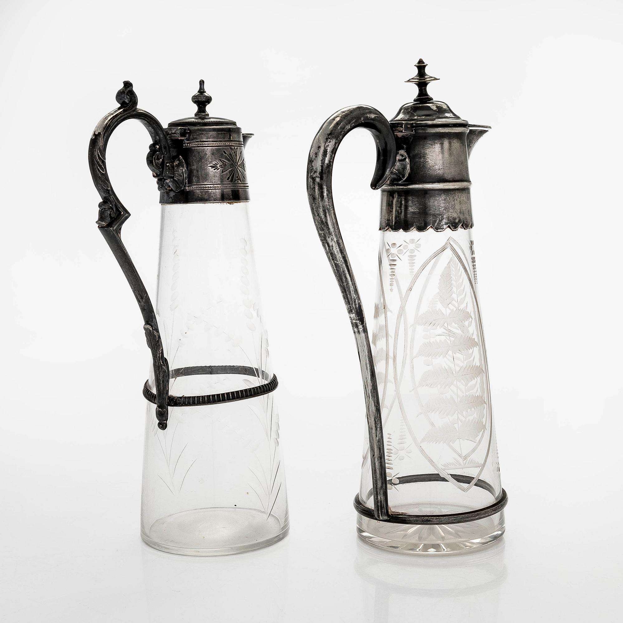 Two wine pitches, around 1900.