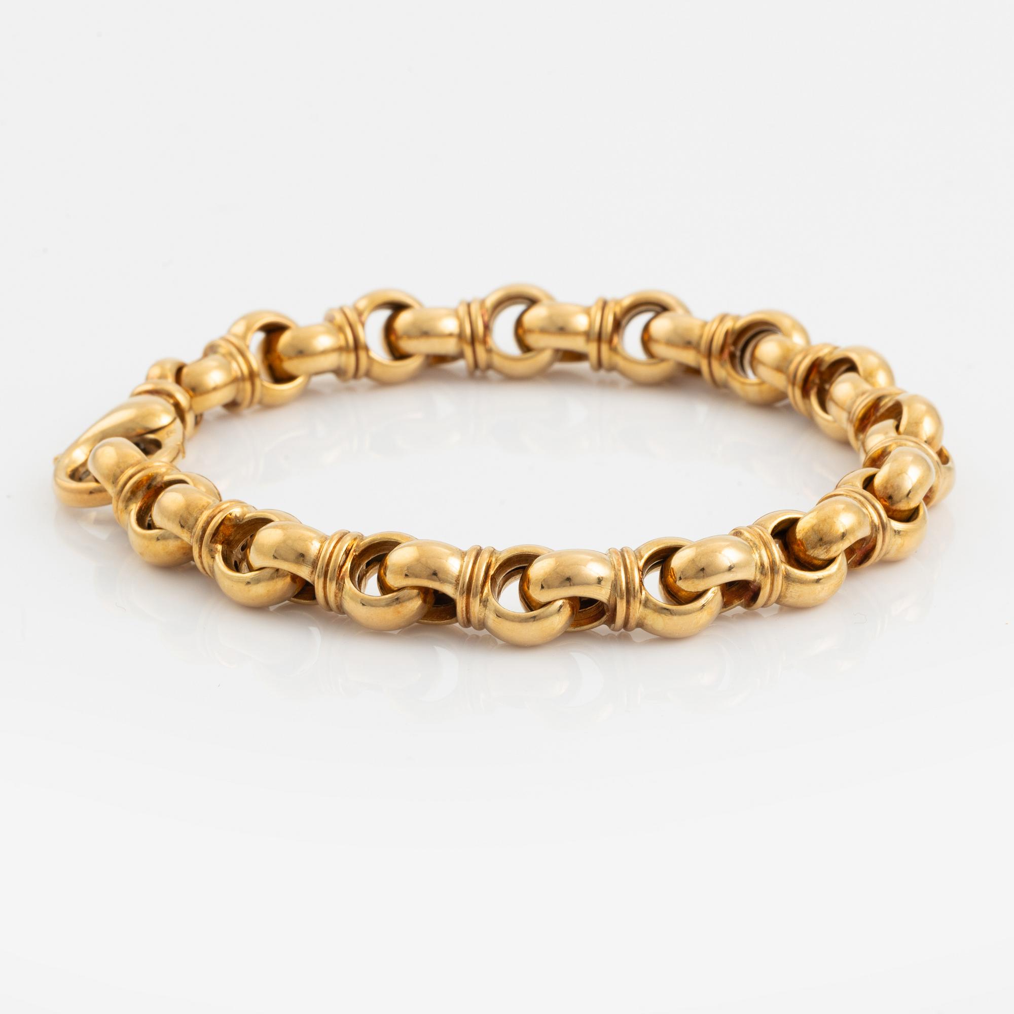 An 18K gold Tännler bracelet.