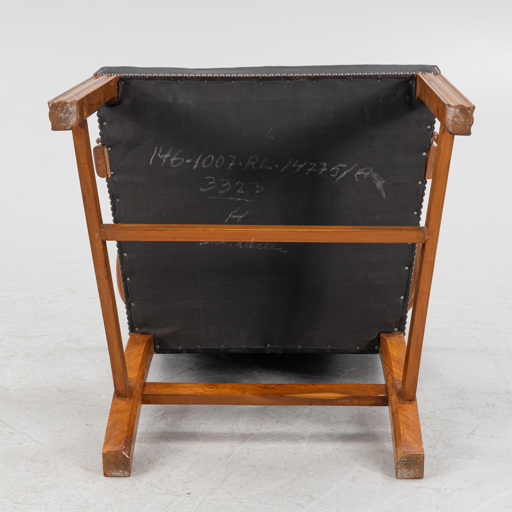 A leather upholstered armchair, 20th Century.