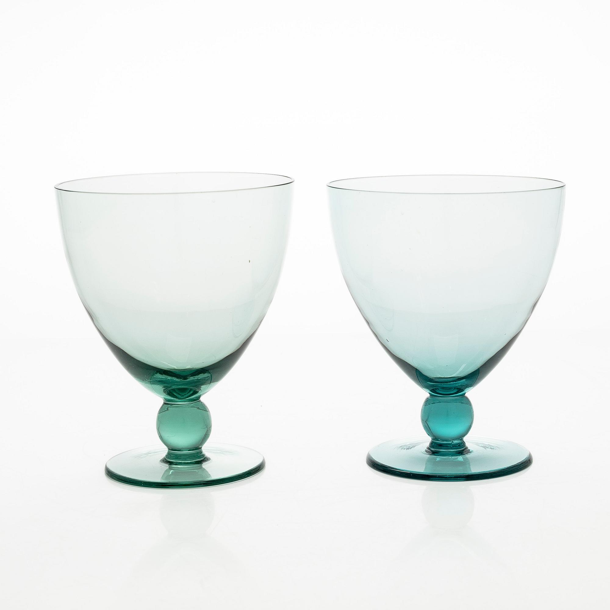 A set of eight wine glasses.