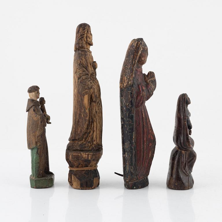 Four wooden sculptures, 18th century or older.