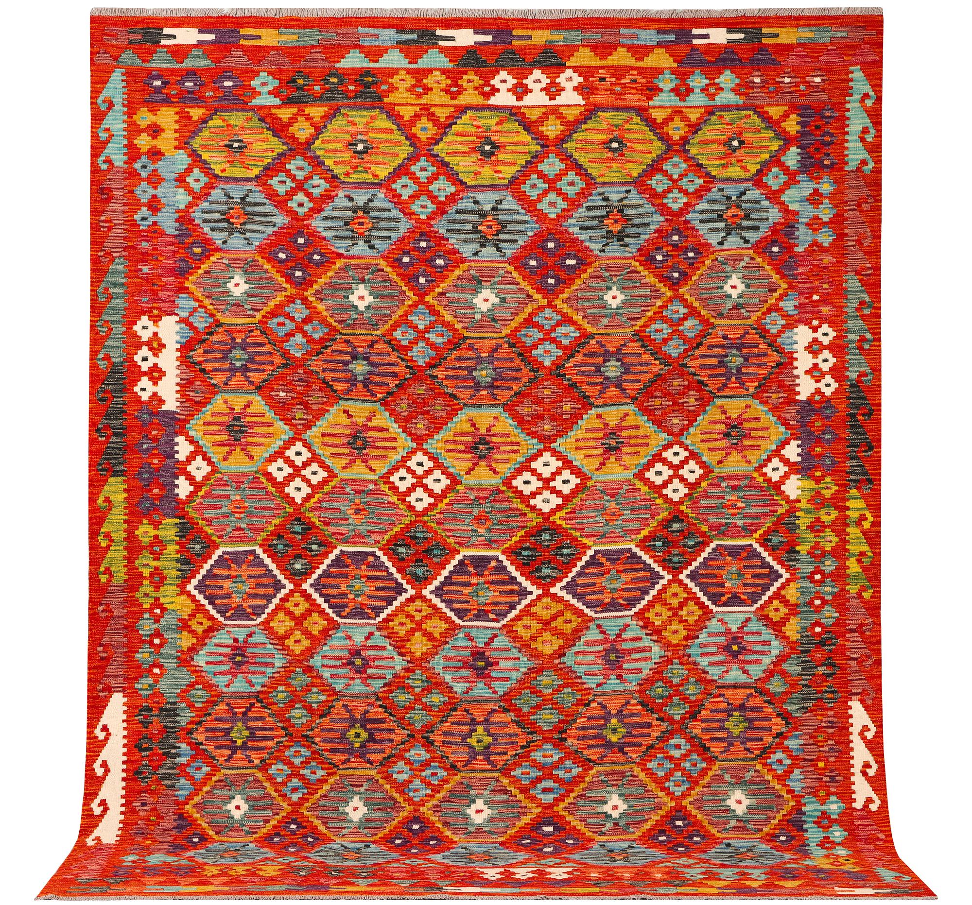 An Afghan kilim carpet, c. 257 x 202 cm.