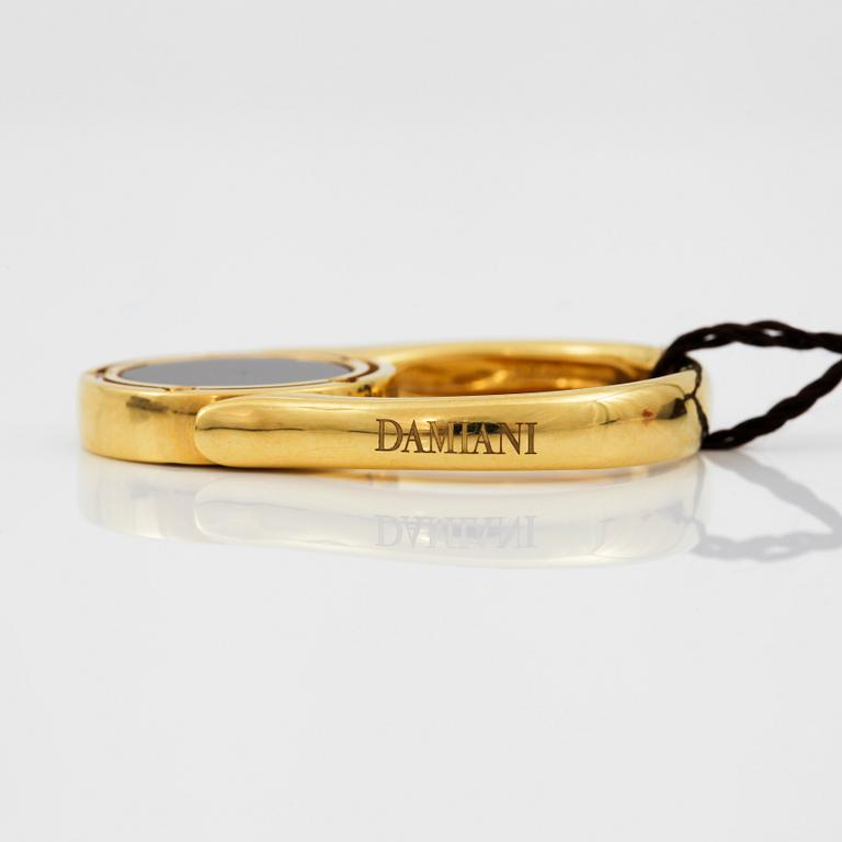 RING, Damiani och Brad Pitt design, Italy. Reversible with Lapis Lazuli, Onys and 10 small diamonds.