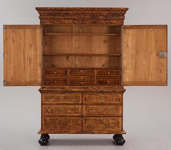 A Swedish late Baroque burr-alder cabinet, Stockholm, first part 18th century.