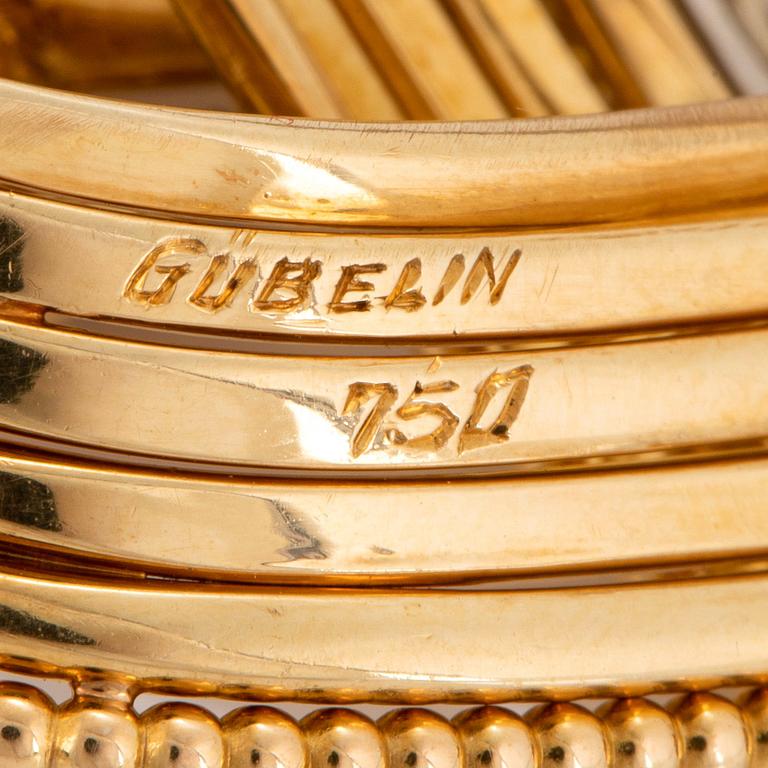 Gübelin brosch 18K guld med runda briljantslipade diamanter.