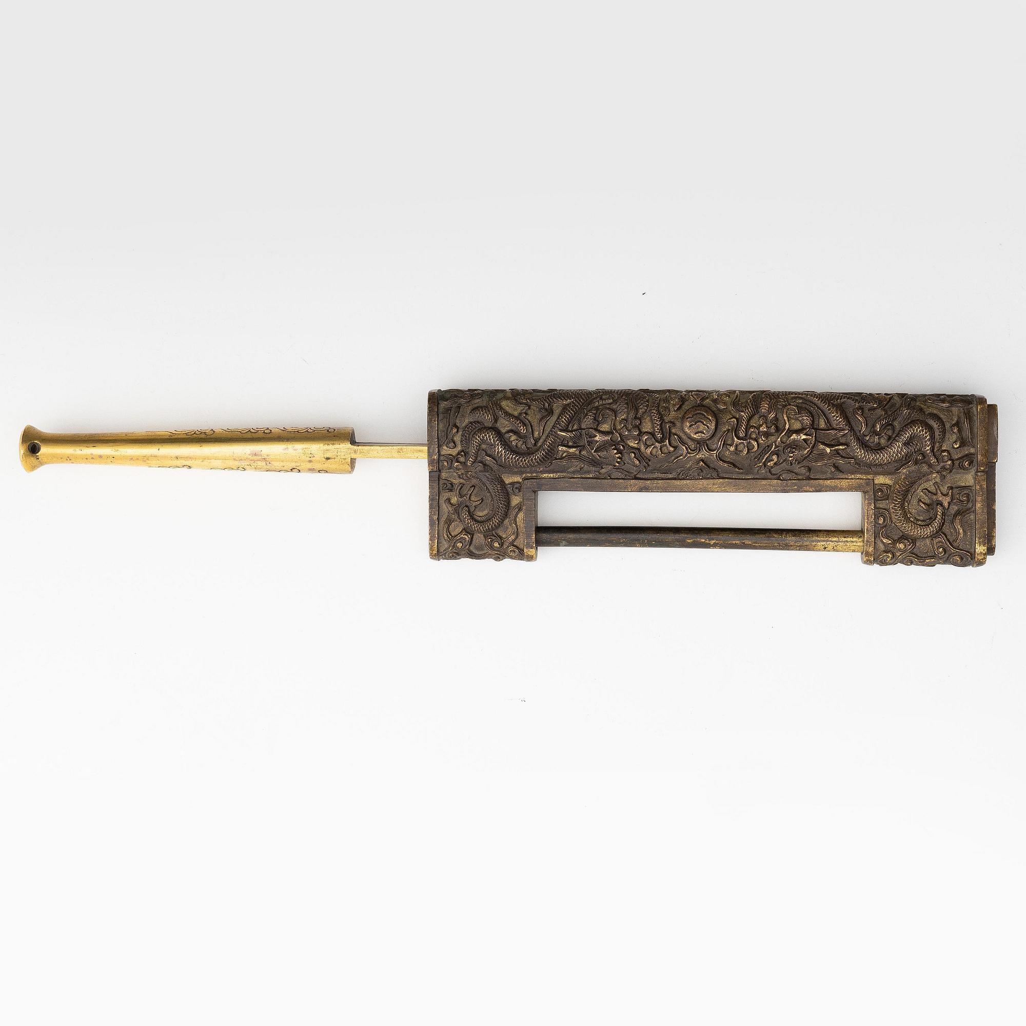 A Chinese gilt five-clawed 'dragon' lock, Qing dynasty, Qianlong (1736-95).