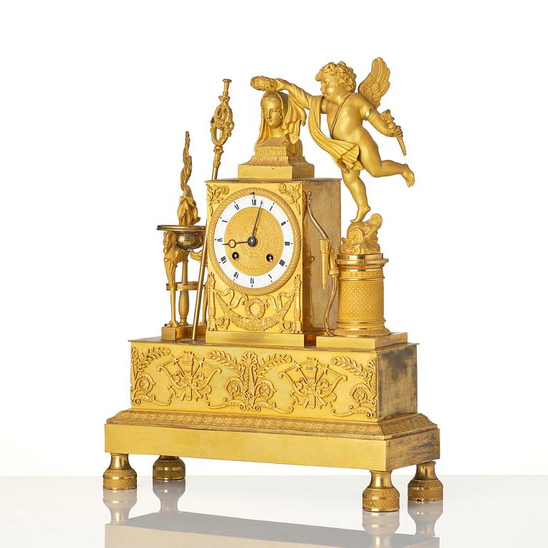 A French Empire ormolu figural mantel clock, early 19th century.