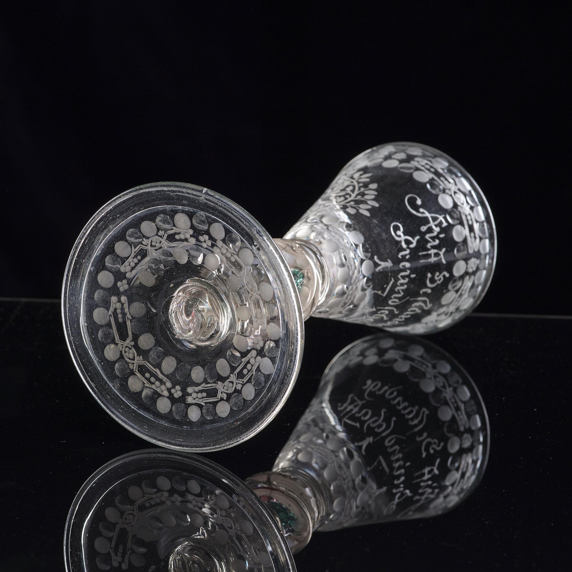 A German cut and engraved glass goblet, 18th Century.