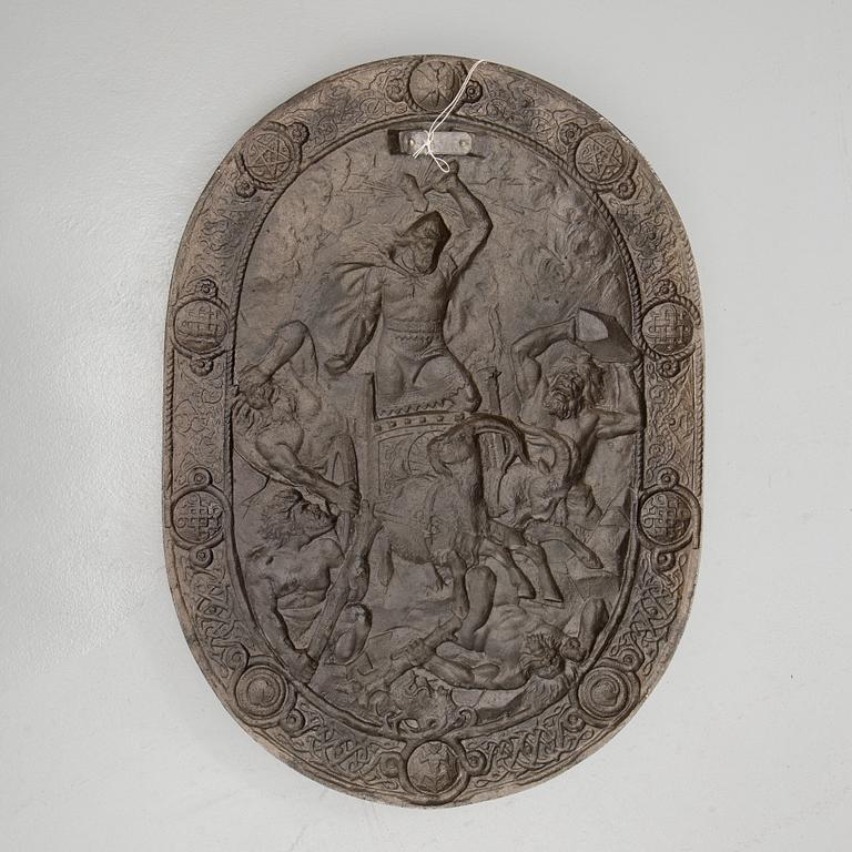 An iron shield by Brevens Bruk, 20th century.