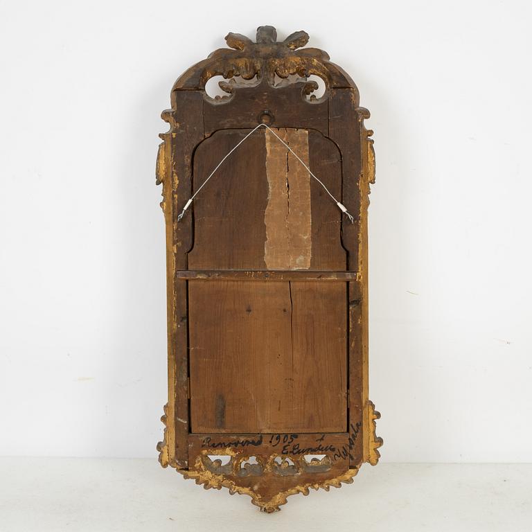 A rococo mirror, second half of 18th Century,