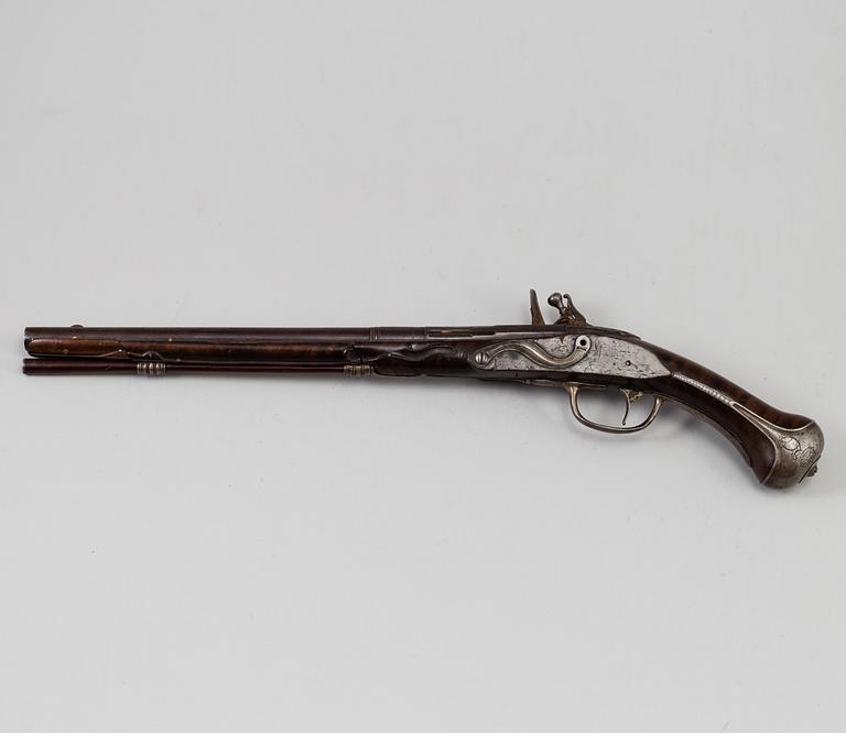 A Danish flint lock pistol signed, (Paul Nielsen Norrman, ca 1700).