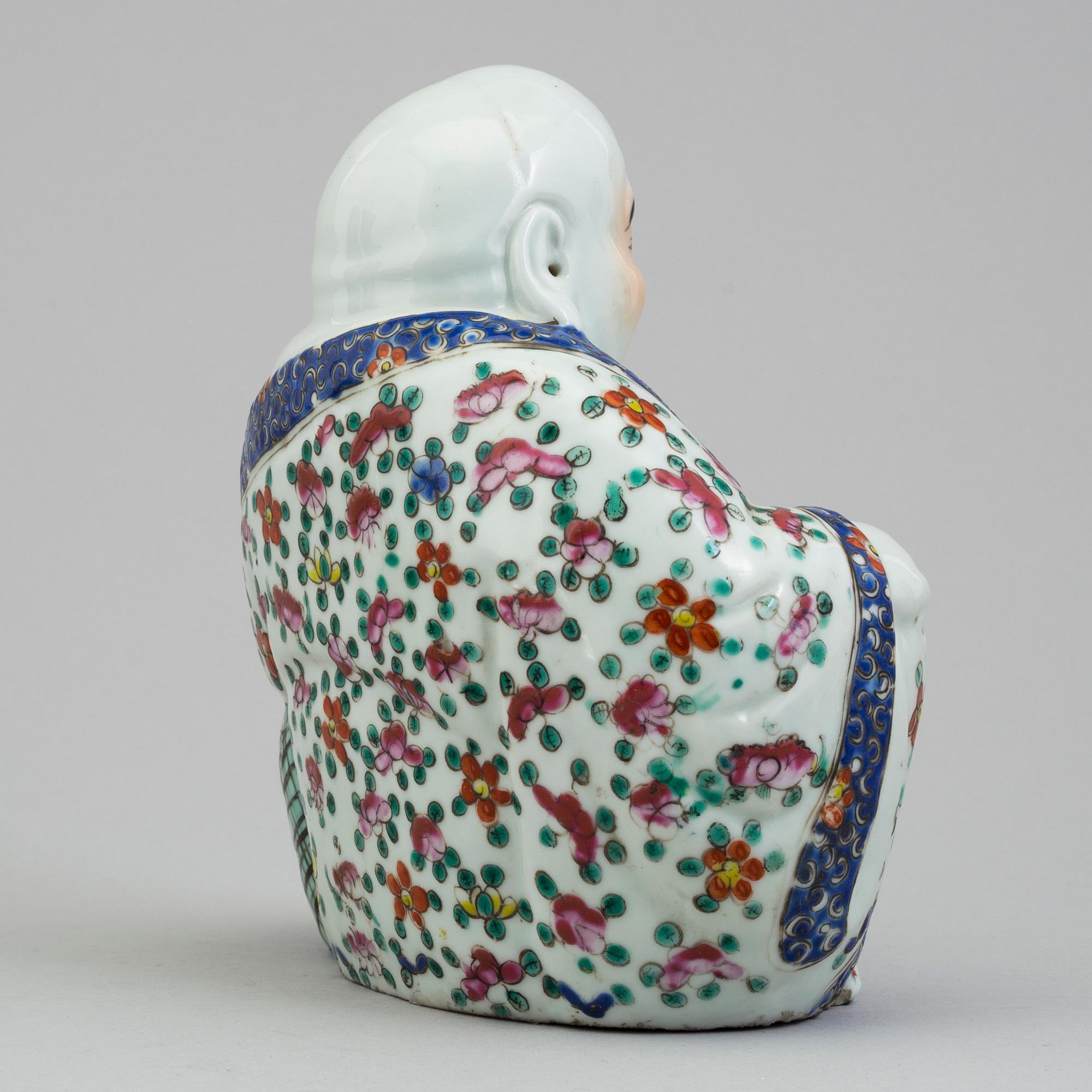 A Chinese 20th century porcelain Buddha.