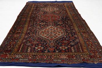 An antique Khamseh runner, southwestern Iran, c. 330 x 157 cm.