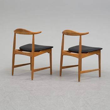 A pair of 1960's 'Danske' oak armchairs by Erik Wörtz IKEA.