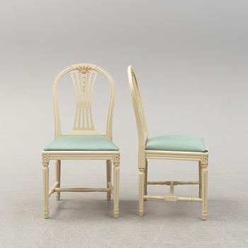A set of six chairs and a dining table, gustavian style, late 20th century.
