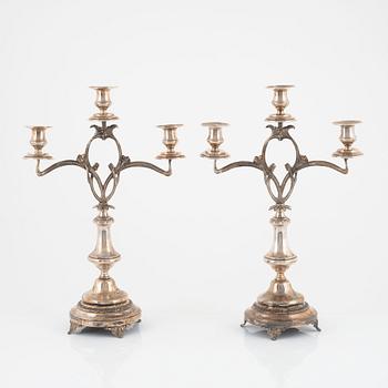 A pair of Art Nouveau silver plated candelabras, early 20th Century.