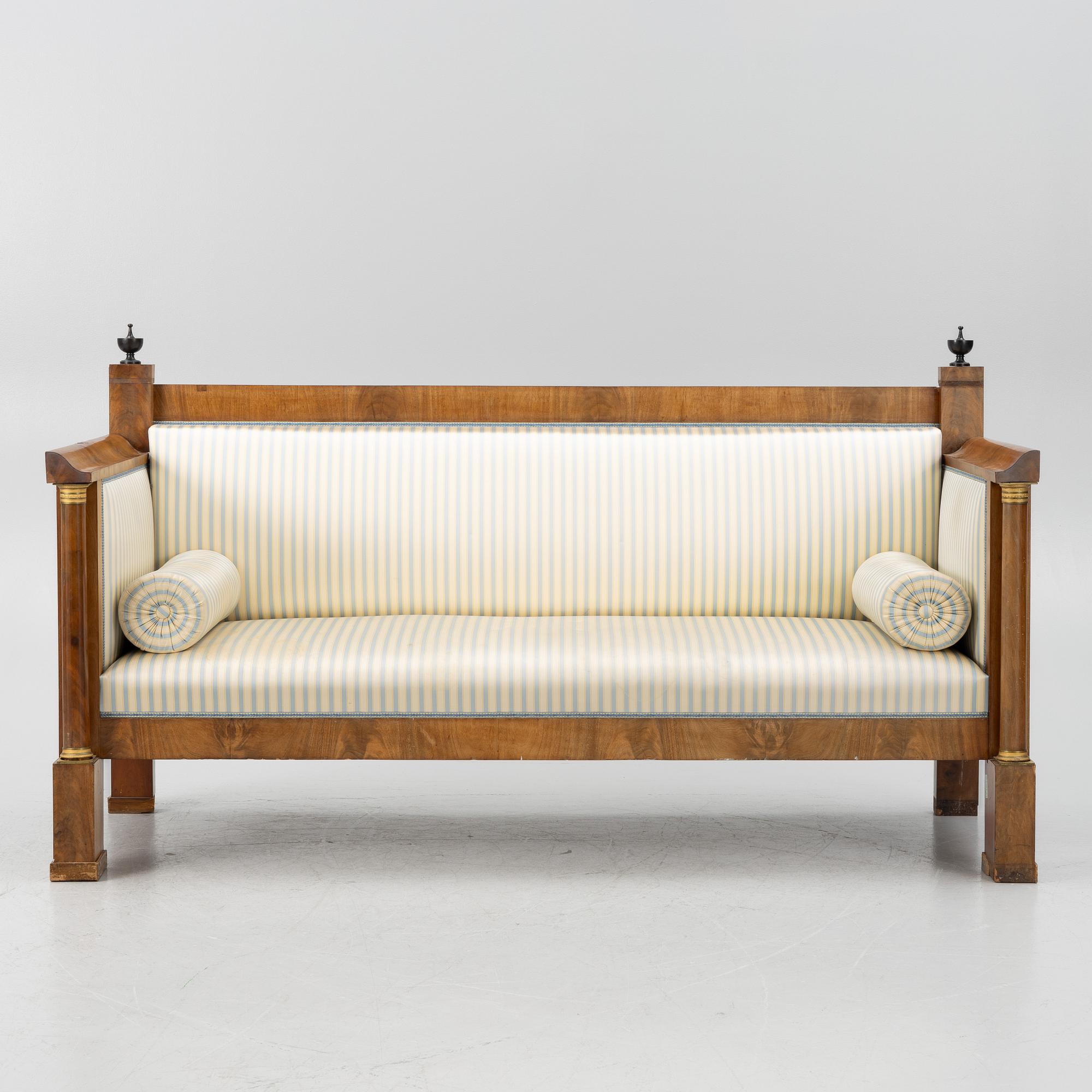 An Empire sofa, first half of the 19th century.