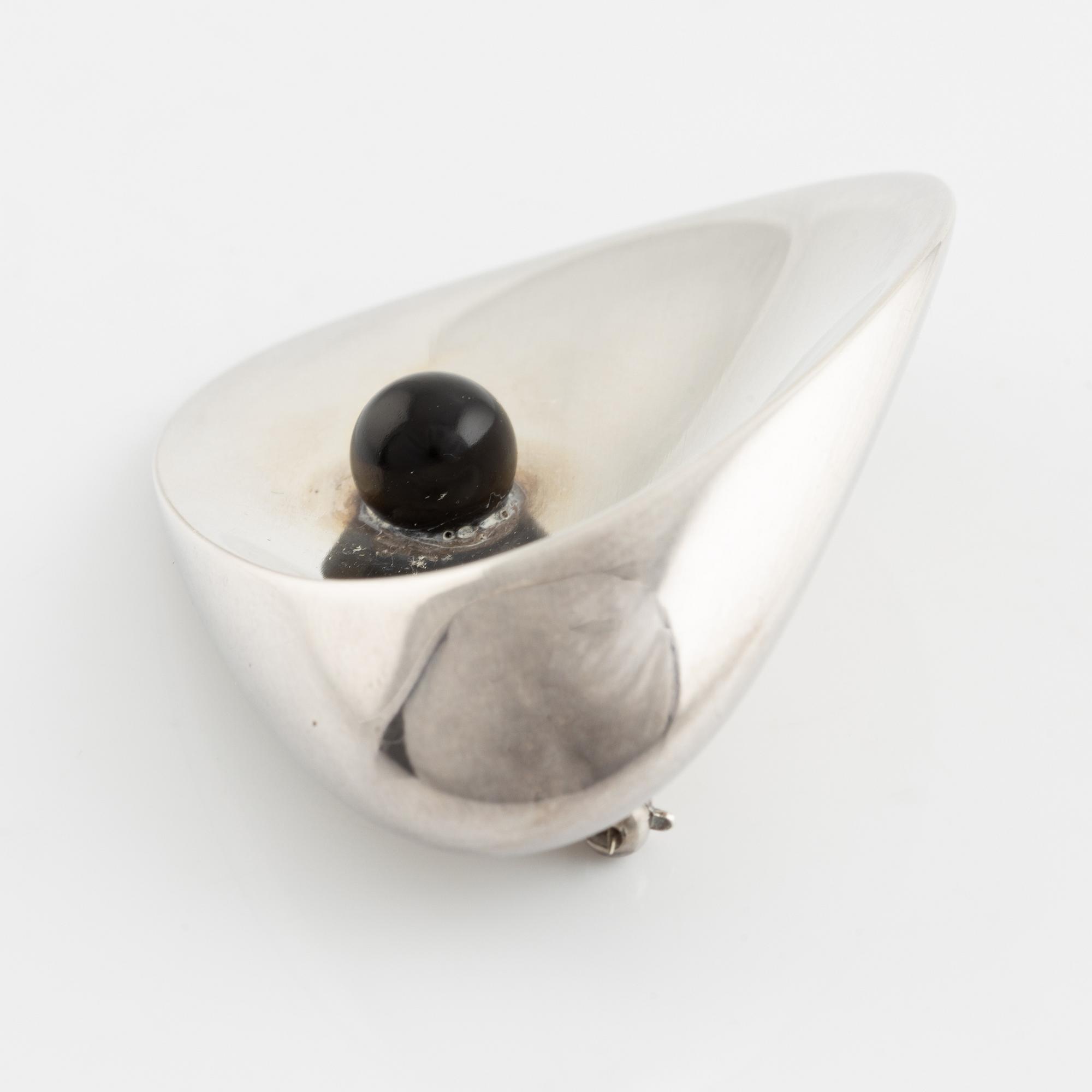 Nanna Ditzel, Georg Jensen, silver, and black pearl resin brooch.