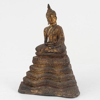 A gilt bronze Rattanakosin Buddha on a Naga throne, Thailand, 19th Century.
