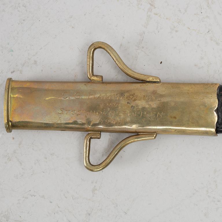Polissabel, 1900-talets början, med balja.