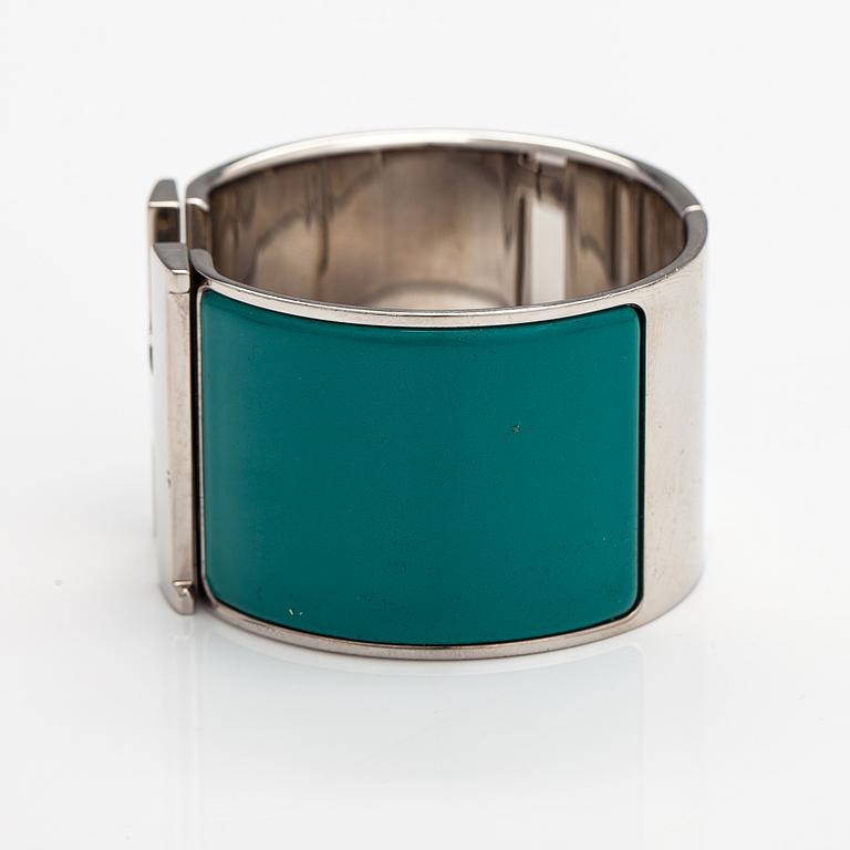Hermès, A "H click" bracelet made of metal and enamel. Marked Hermès, S, Made in France.