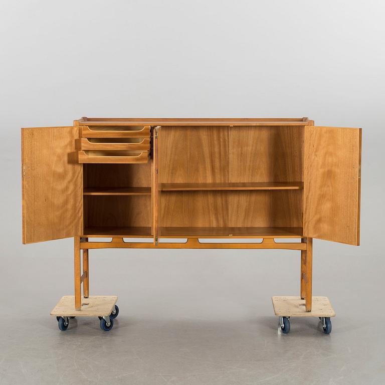 A 1950s Swedish Modern cabinet, made by AB Westbergs Möbler.