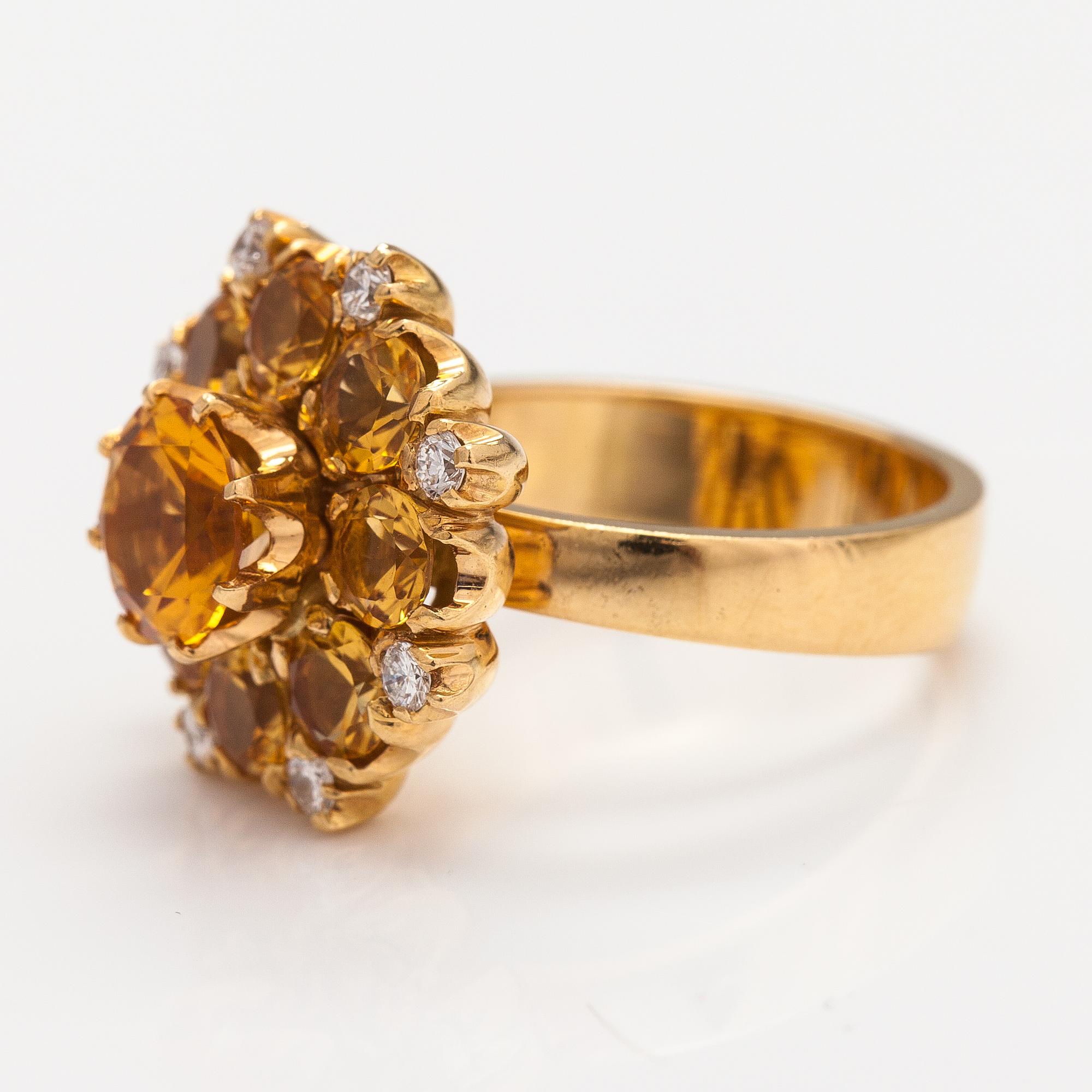 An 18K gold ring "Catherine the great" with citrines and ca. 0.20 ct of diamonds. Ofelia Jewelry, Helsinki 1998.