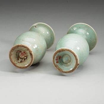 A pair of celadon glazed vases, presumably Yuan/Ming dynasty.