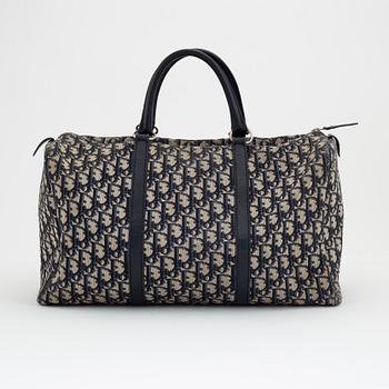 Christian Dior, a canvas handbag, toilet bag and key holder.