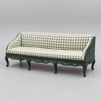 A mid 18th century rococo sofa.