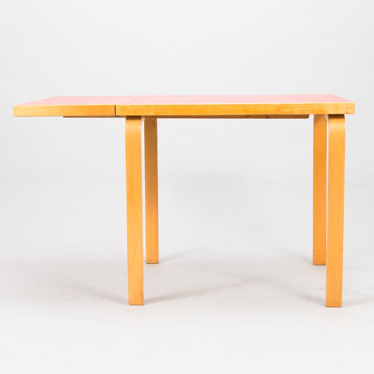A mid-20th century drop leaf table for Artek Finland.