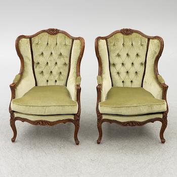 A pair of bergère armchairs, rococo-style, first half of te 20th century.