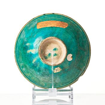 A conic Kashan pottery bowl, central Persia, 11th century.