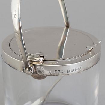 A glass and silver marmelade jar and spoon by Hukin & Heath Birmingham, England, 1934.