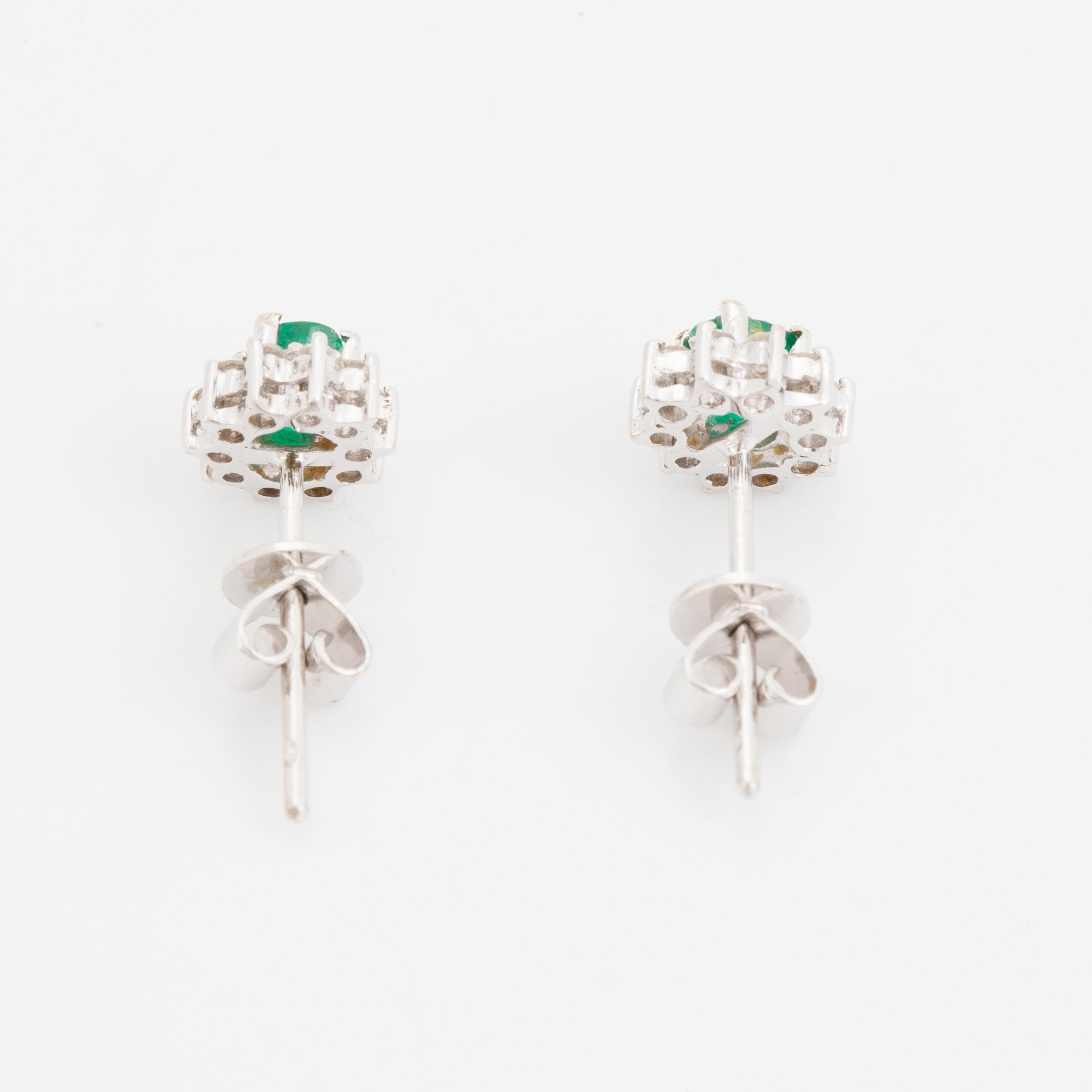Emerald and brilliant cut diamond earrings.
