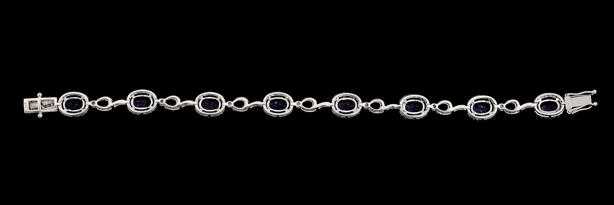 ARMBAND, 18K vitguld, diamanter tot ca 1.65 ct, 8 tanzaniter tot ca 5.70 ct.