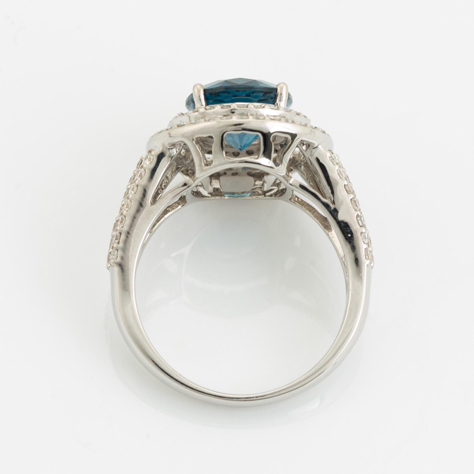 Topaz and brilliant cut diamond ring.