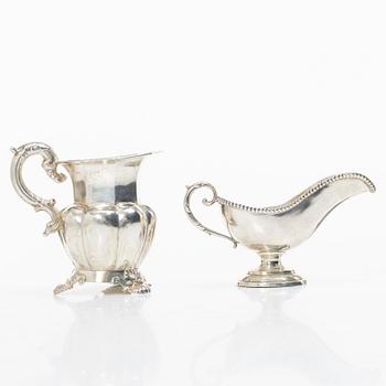 A silver gravy boat, Germany, and a silver creamer, johan Petter Tullgren, Sweden, 1857.