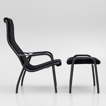 Yngve Ekström, a 'Lamino' easy chair with footstool, Swedese, 2018.