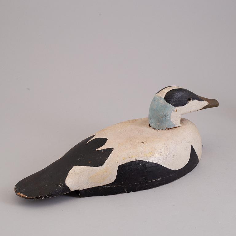 4 painted wooden ducks from the 20th century.