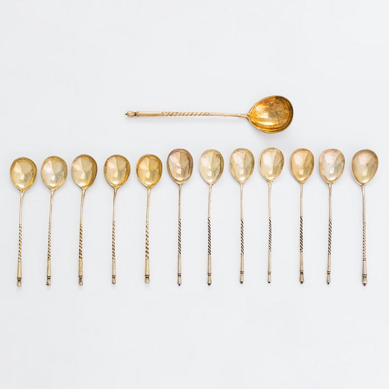 Twelve parcel-gilt teaspoons and a jam spoon, Russia 1887-1926.