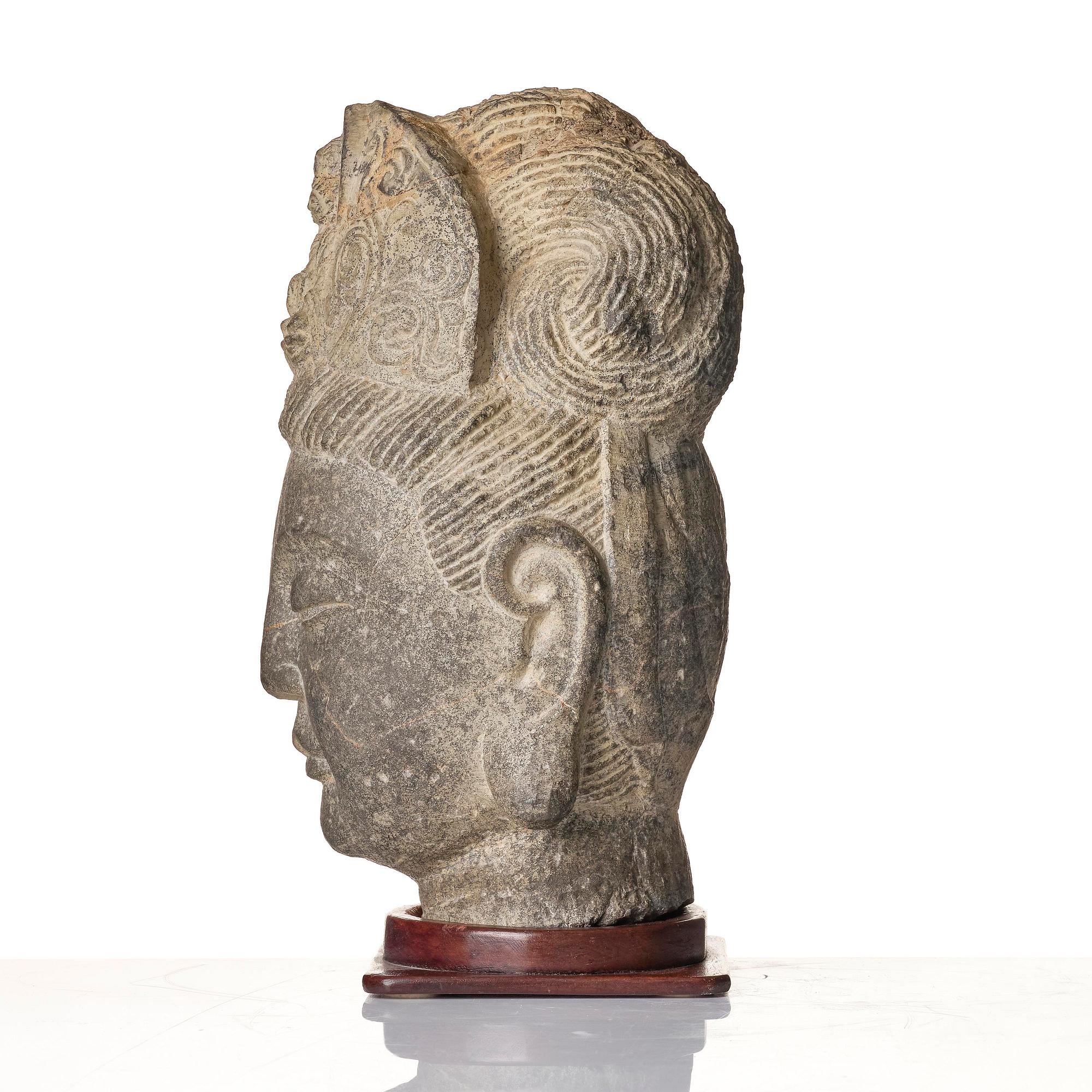 A large well sculptured head of Guanyin, Ming dynasty (1368-1644).