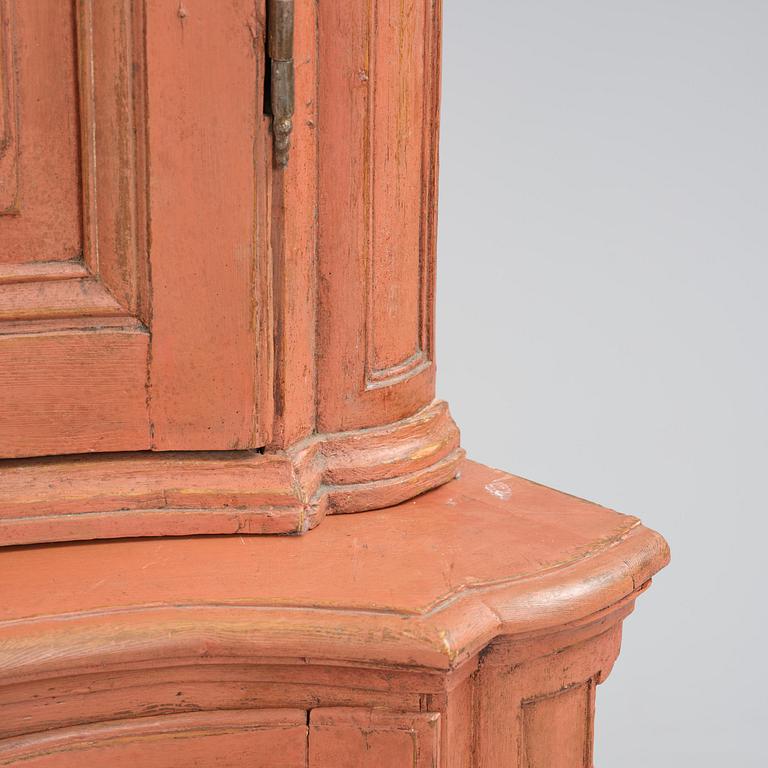 A rococo corner cabinet, later part 18th century.