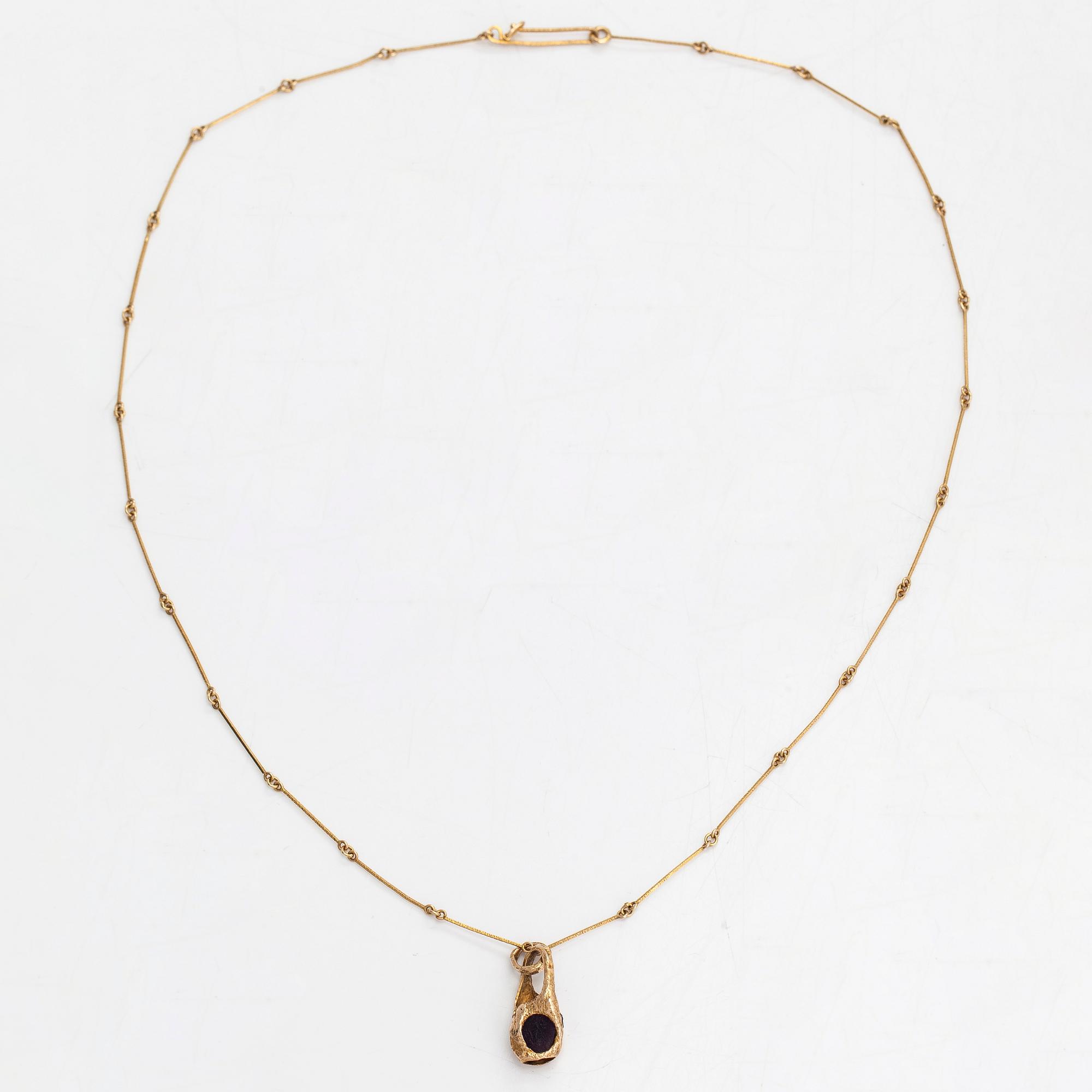 Björn Weckström, halsband, "Renklockan", 14K guld och ametist, Lapponia 1974.