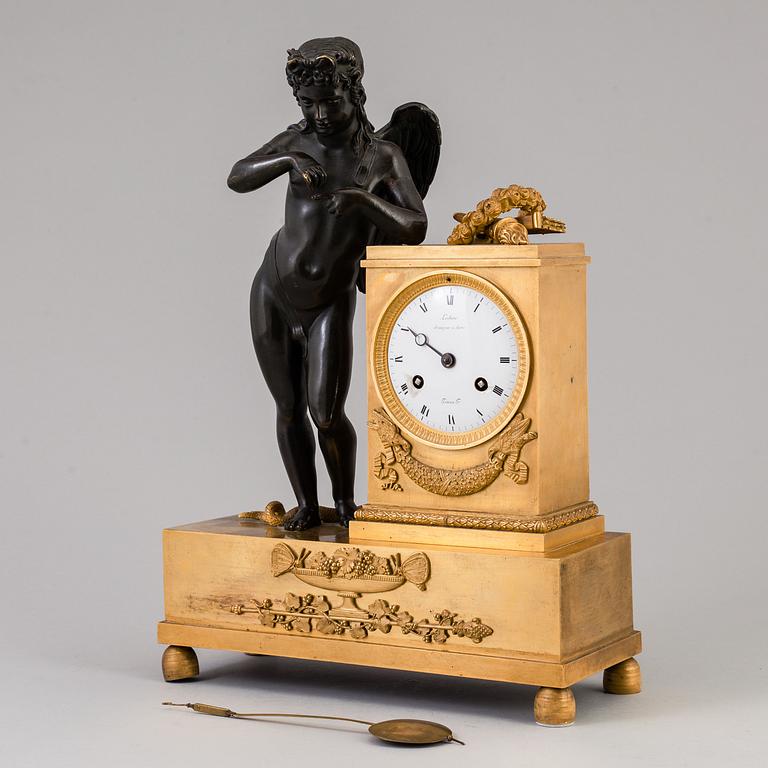 A French empire early 19th century mantel clock.